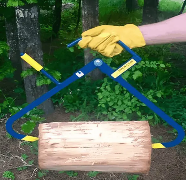 Log lifter tool holding a wooden log.